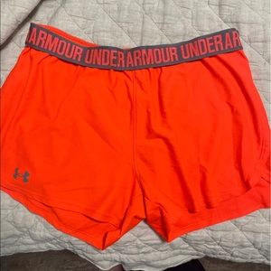 Orange Under Armour shorts